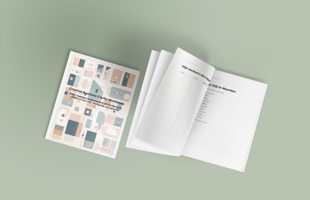 InDesign workbook book mockup with cover and inside pages.